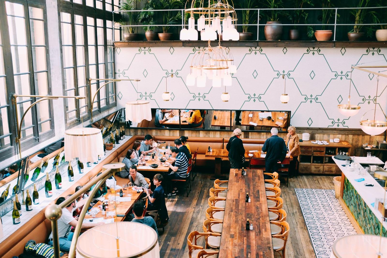 A small dining room with tables