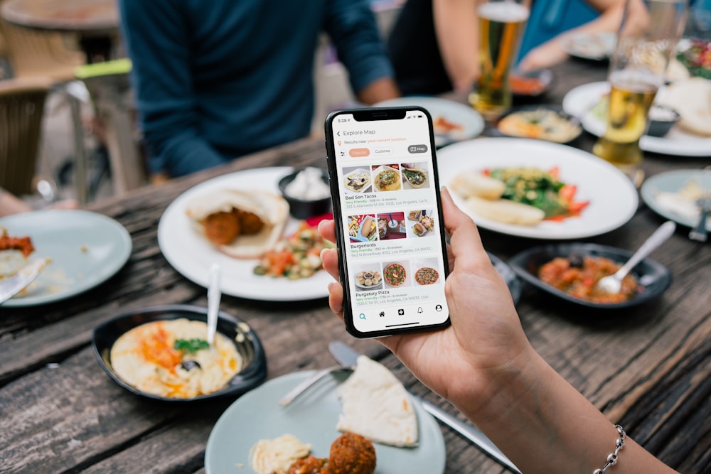 A phone showing a message from a restaurant